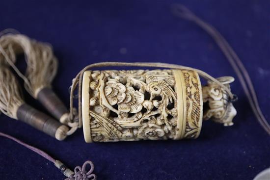 Two 19th century Chinese ivory pomanders and a similar purse